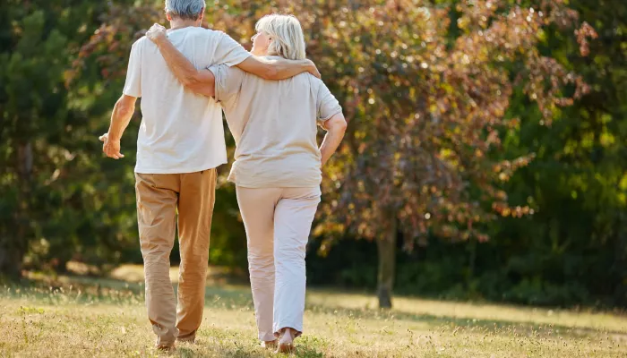 Old people walking in nature