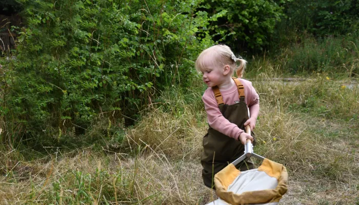 Toddler with a sweep net