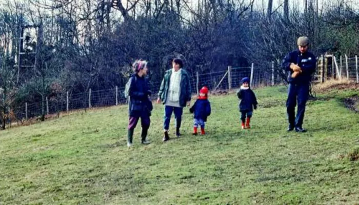 A family walking on Polhill.