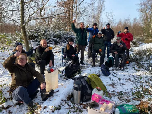 Sevenoaks Nature Gardens Volunteers all out in the snow posing for a picture by Joanne Bradley