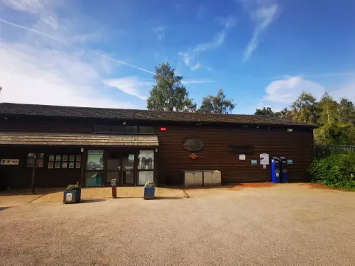 Sevenoaks visitor centre on a sunny day with a clear sky in the background